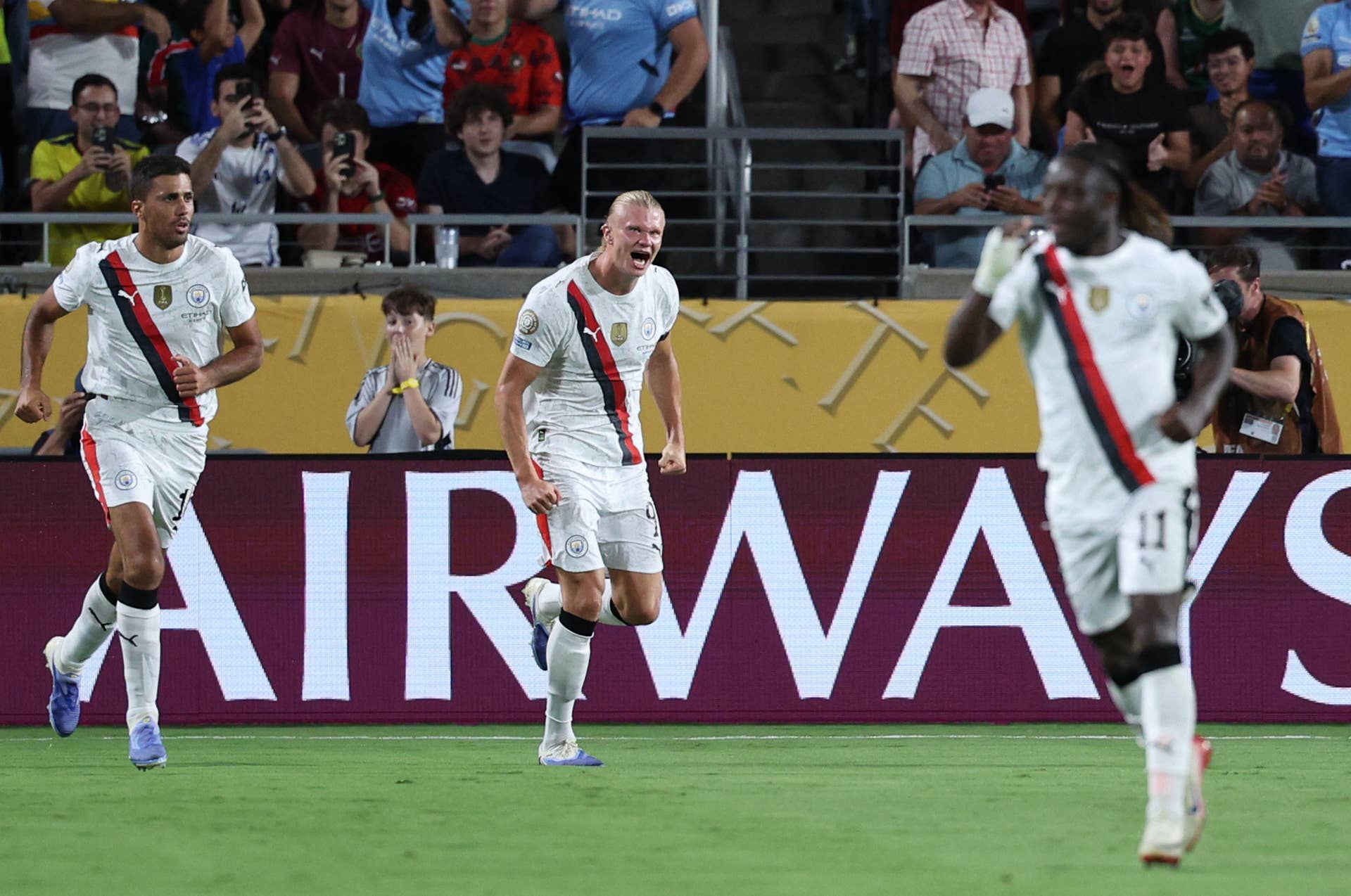 Jun 30, 2025; Orlando, Florida, USA; Manchester City forward Erling Haaland (9) celebrates with midfielder Rodri (16) after scoring in the second half during a round of 16 match of the 2025 FIFA Club World Cup at Camping World Stadium. Mandatory Credit: Nathan Ray Seebeck-Imagn Images
